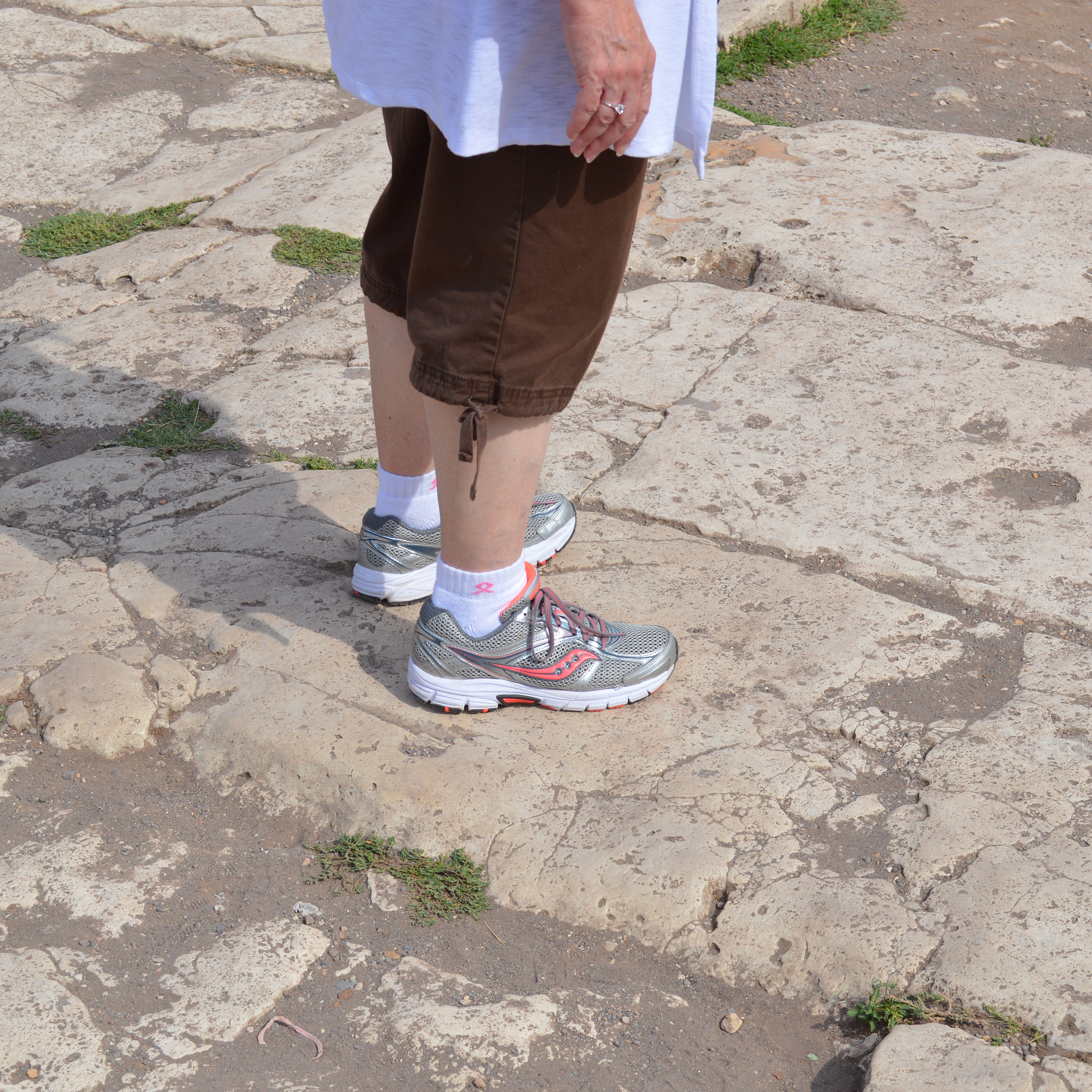 karen-standing-on-the-orginal-paving-stones-of-the-forum-street